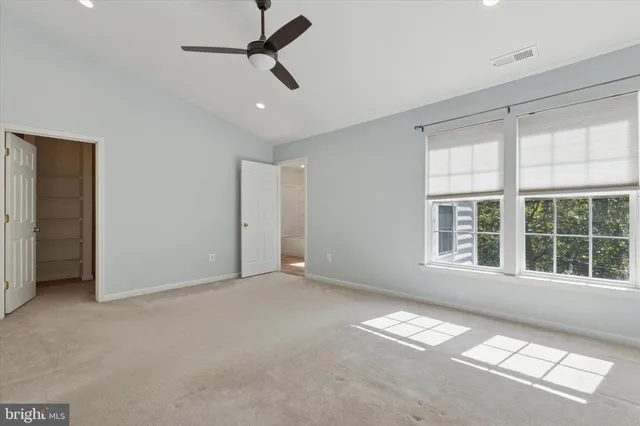 a view of empty room with windows