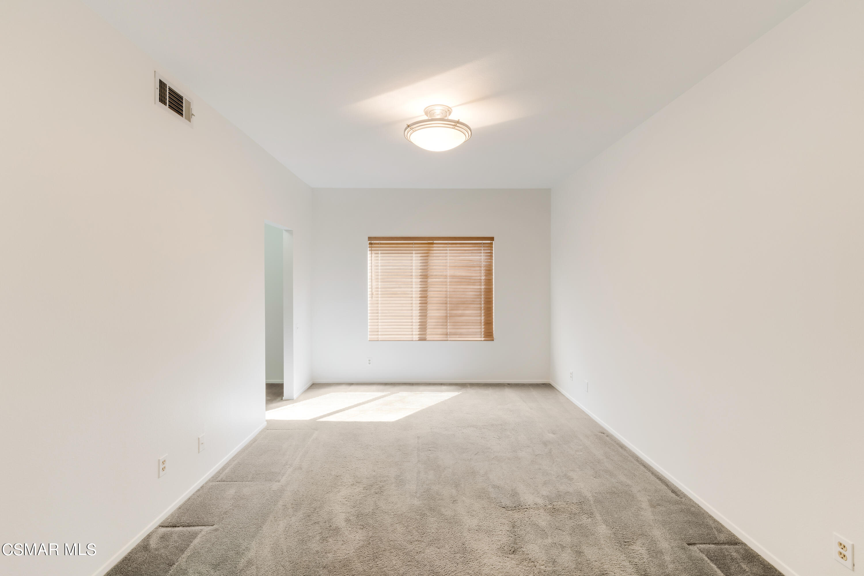 11661 Chestnut Ridge Street Moorpark, CA 93021 - Photo 13 of 39 a view of an empty room with a window
