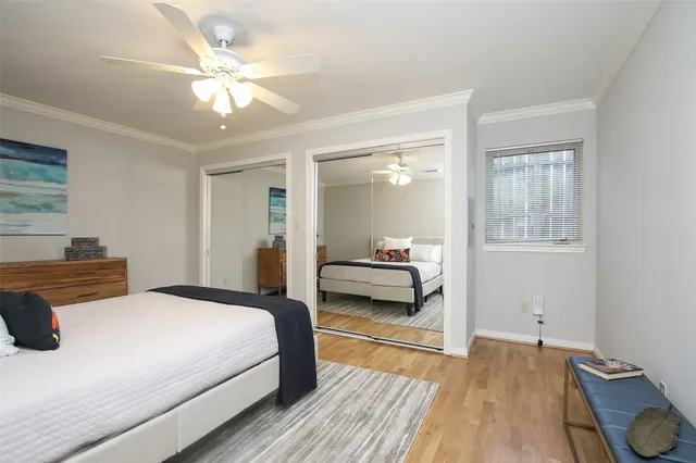 a bedroom with a bed and a walk in closet