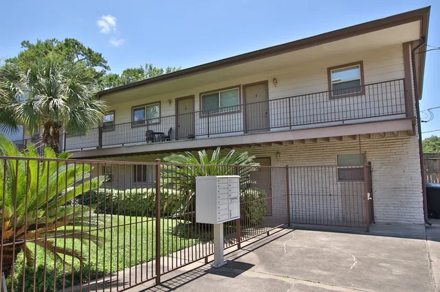 an aerial view of a house with a garden