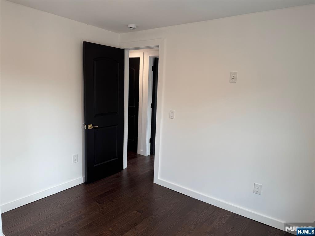 56 Myrtle Avenue, Unit 2 Allendale, NJ 07401 - Photo 11 of 15 wooden floor in an empty room