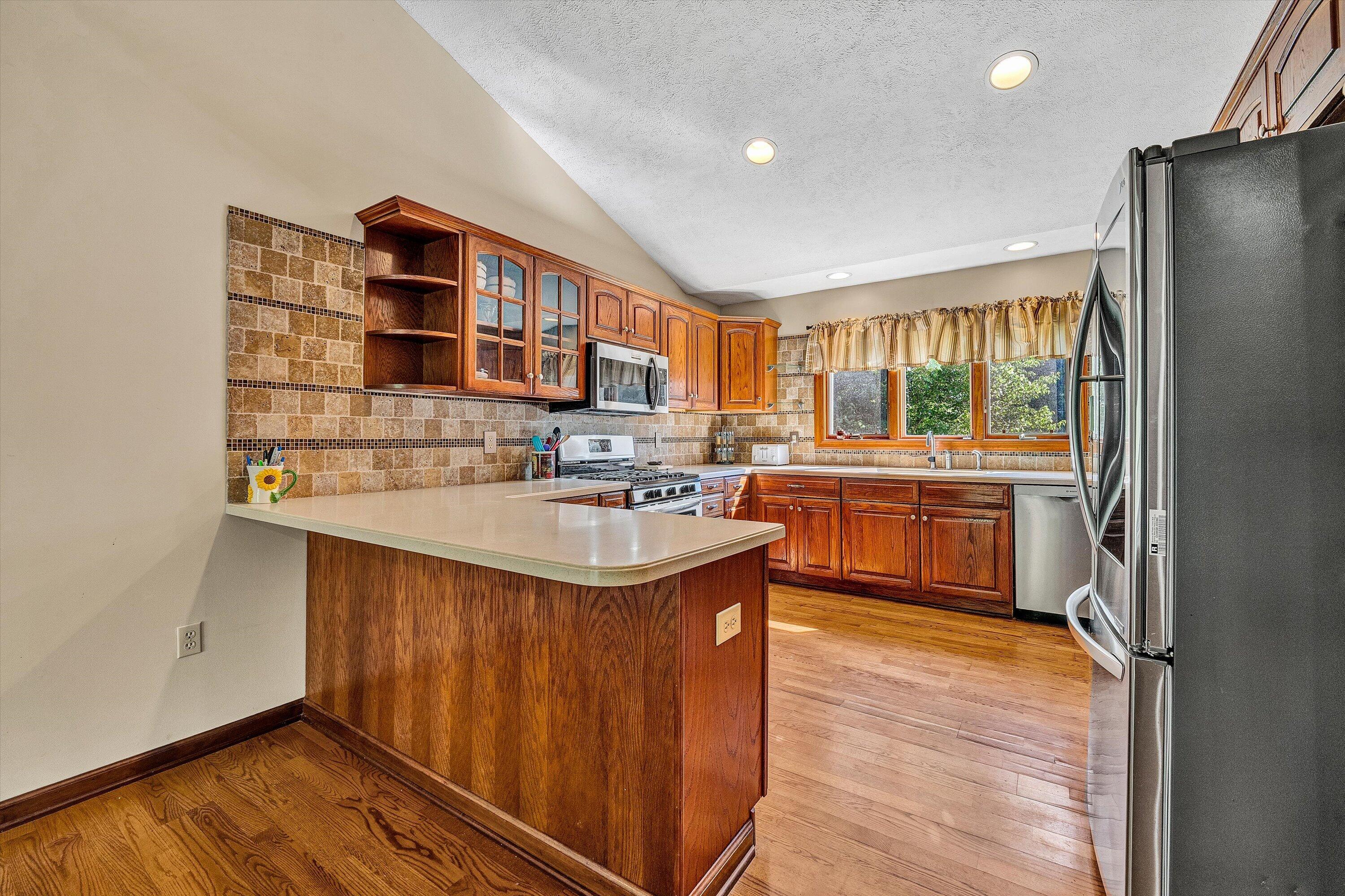 400 Harbor Moneta, VA 24121 - Photo 11 of 51 a kitchen with stainless steel appliances a sink and a refrigerator