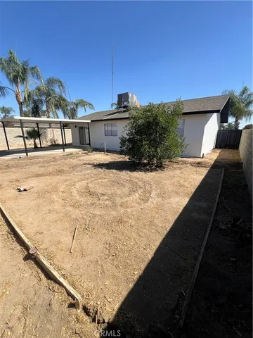 a view of a swimming pool with a lounge chairs