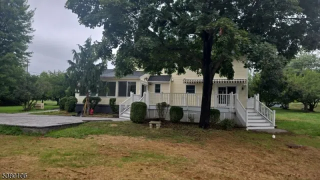 a front view of a house with a patio