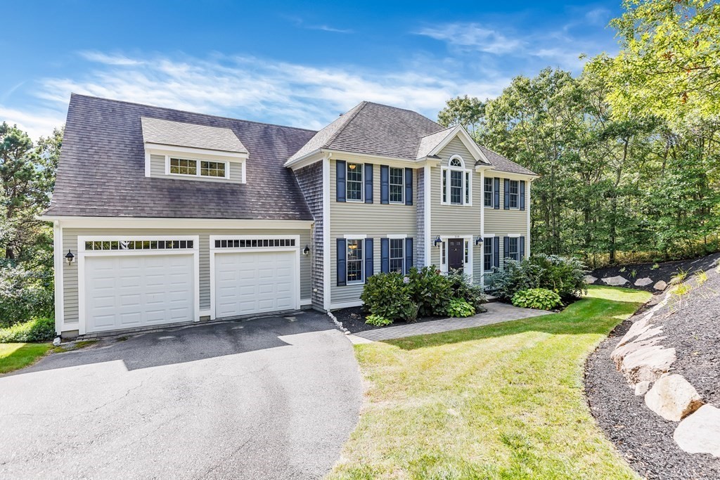 359 Service Road East Sandwich, MA 02537 - Photo 1 of 36 a front view of a house with garden