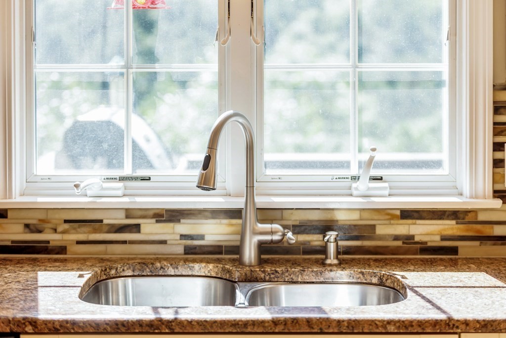 359 Service Road East Sandwich, MA 02537 - Photo 13 of 36 a kitchen with a sink and a window