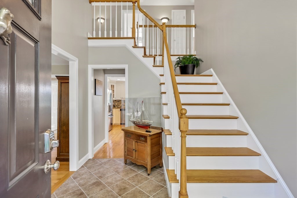 359 Service Road East Sandwich, MA 02537 - Photo 2 of 36 a view of entryway and hall with wooden floor