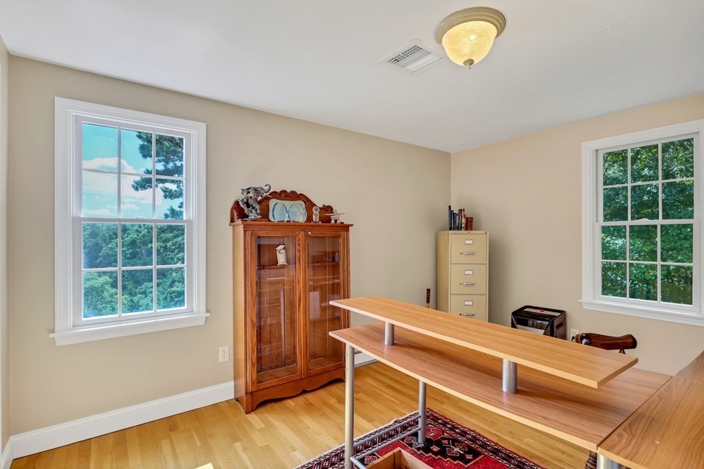 359 Service Road East Sandwich, MA 02537 - Photo 27 of 36 a living room with furniture and a window