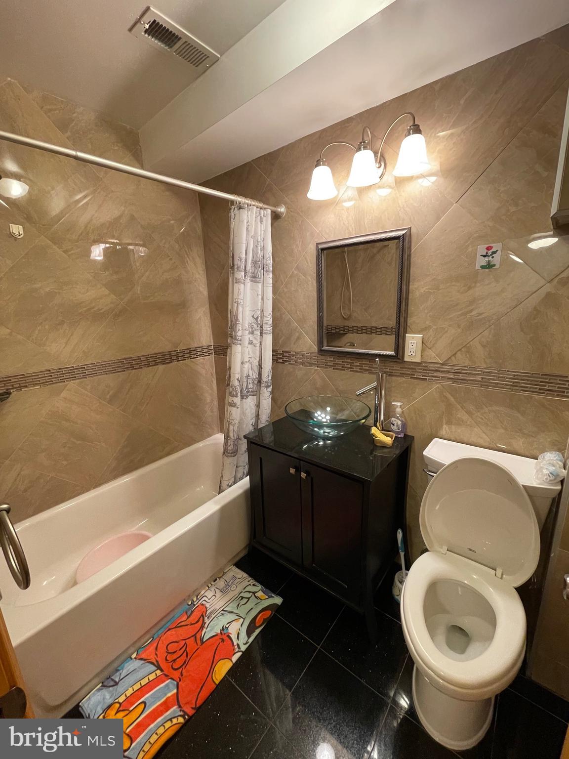 813 Federal Street Philadelphia, PA 19147 - Photo 23 of 28 a bathroom with a sink and a mirror