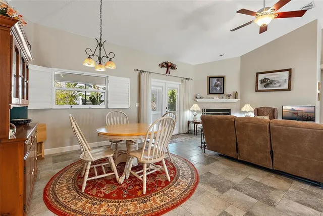 a view of a dining room with furniture