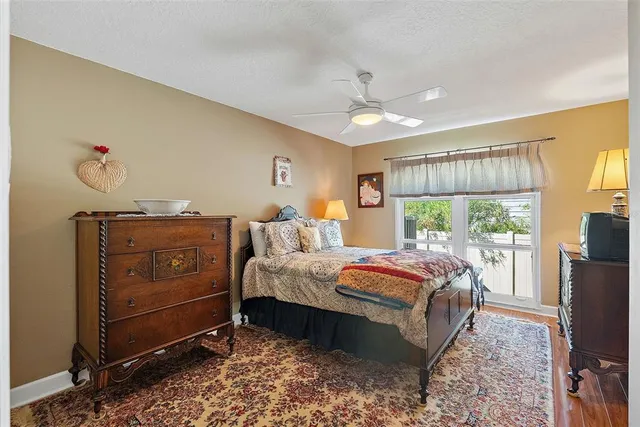 a bed room with a bed and a window