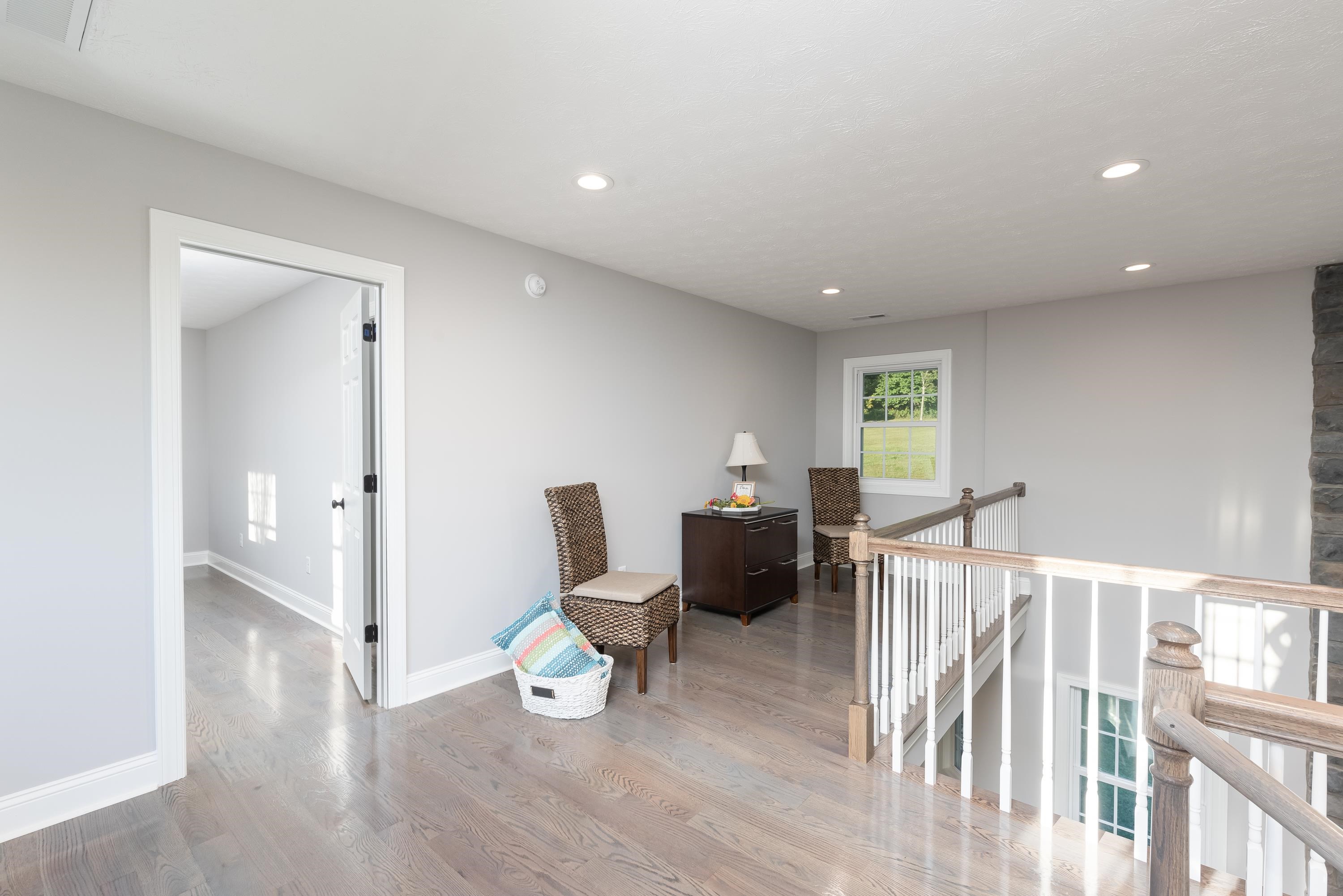 1261 Newport Road Raphine, VA 24472 - Photo 54 of 74 a view of a livingroom with wooden floor and glass windows