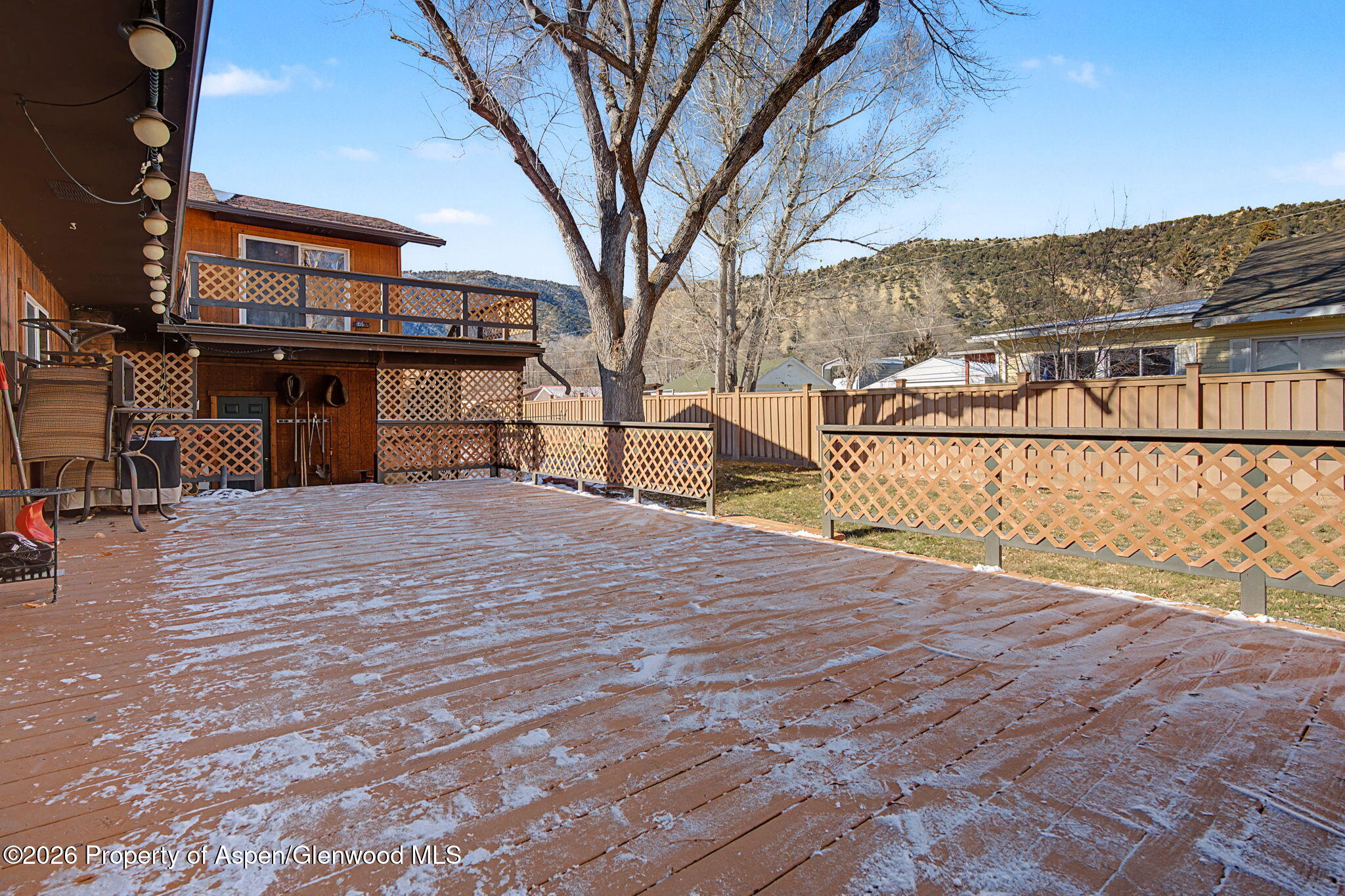 825 Cleveland Street Meeker, CO 81641 - Photo 33 of 41 a view of a house with a yard