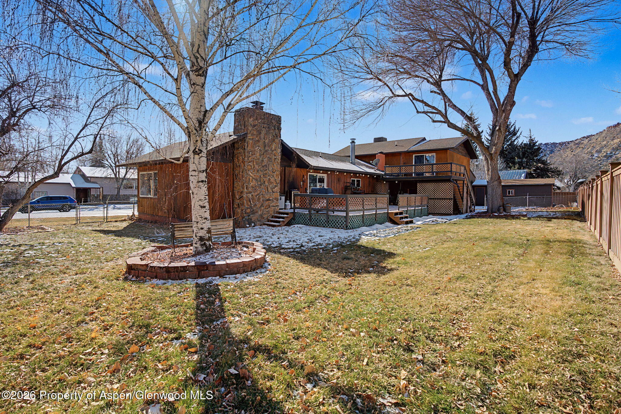 825 Cleveland Street Meeker, CO 81641 - Photo 34 of 41 a swimming pool with outdoor seating and yard