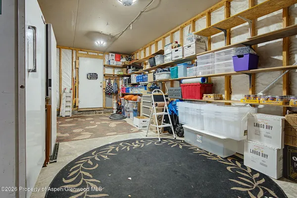 a storage room with storage and utility