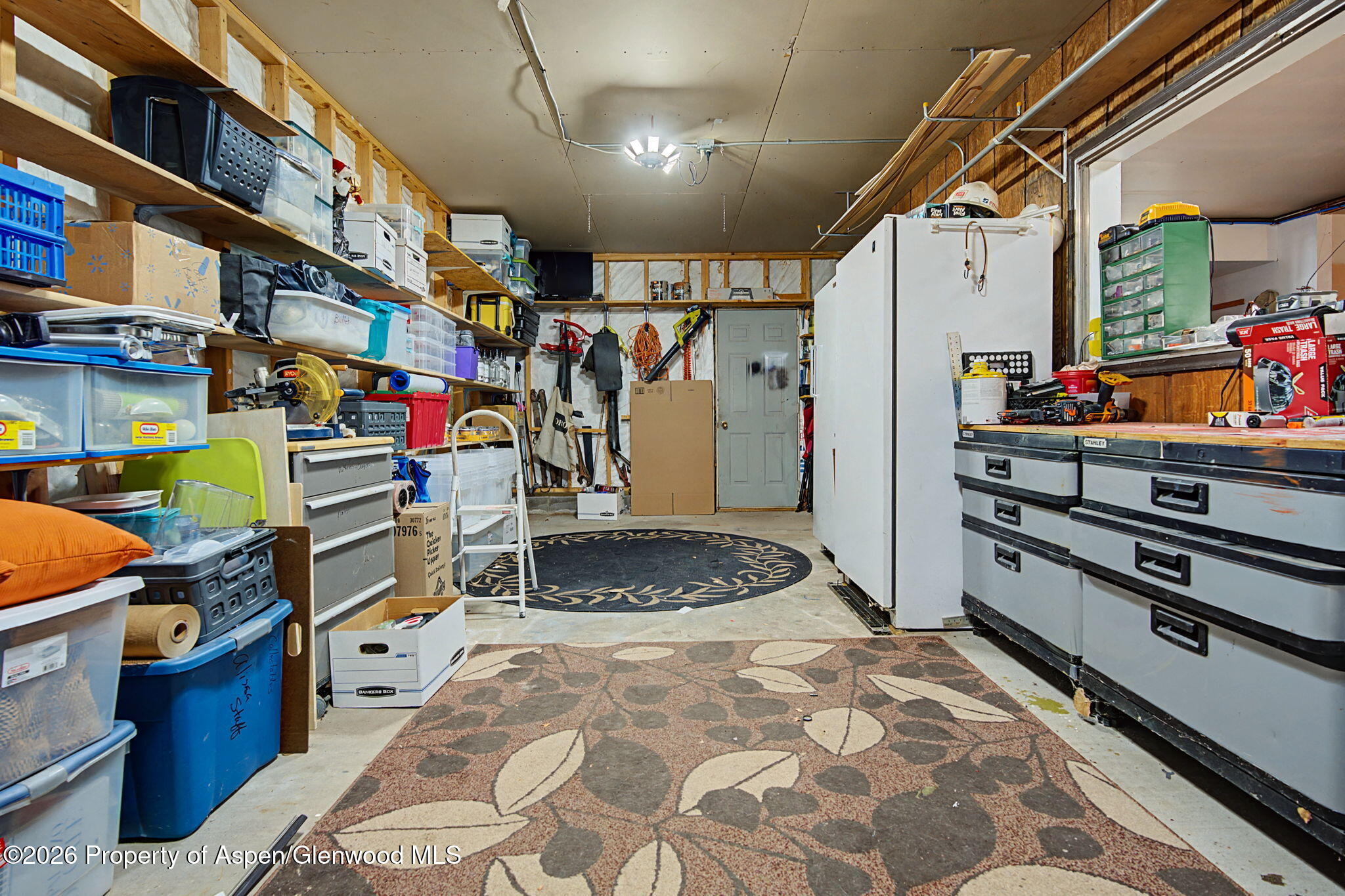 825 Cleveland Street Meeker, CO 81641 - Photo 40 of 41 a storage room with storage and utility