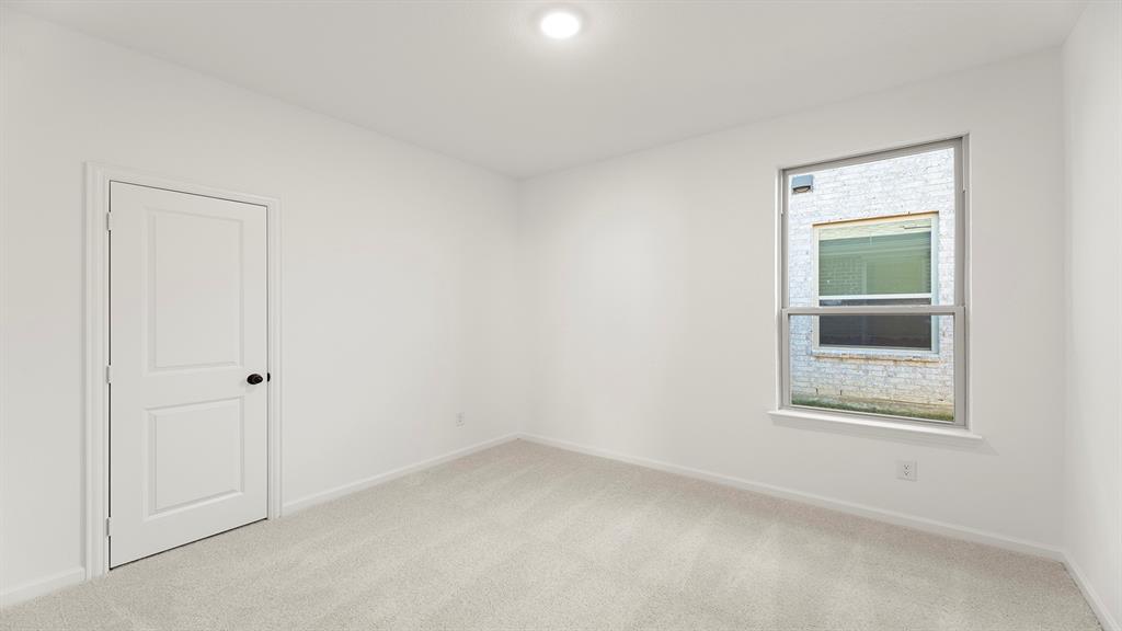 2516 YO Rnch Road Anna, TX 75409 - Photo 11 of 30 an empty room with a window