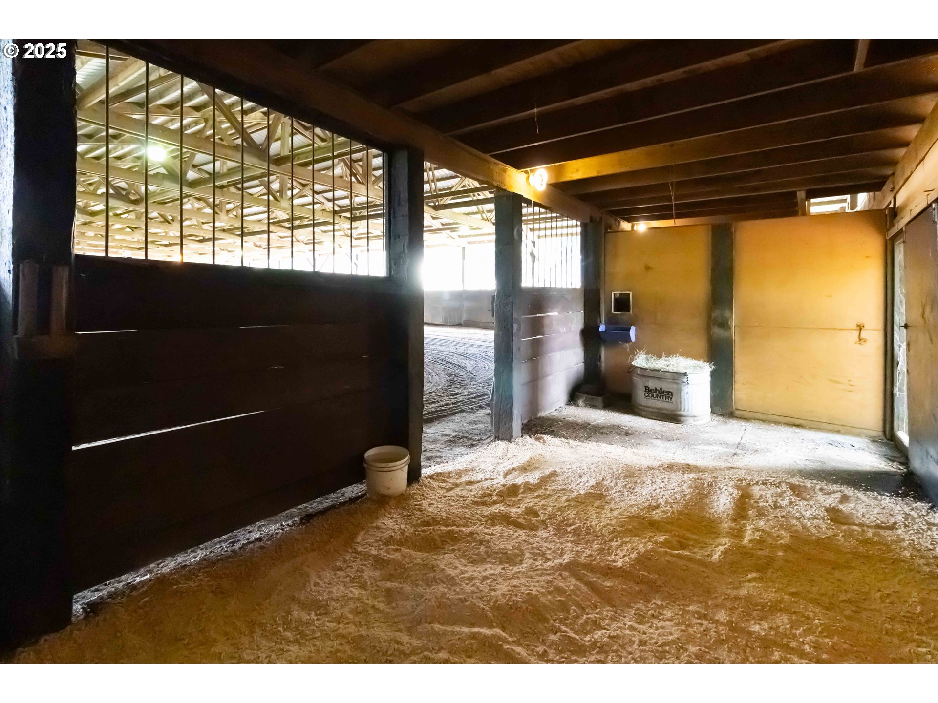 720 Abernathy Creek Road Longview, WA 98632 - Photo 35 of 44 a view of a room with wooden floor and windows