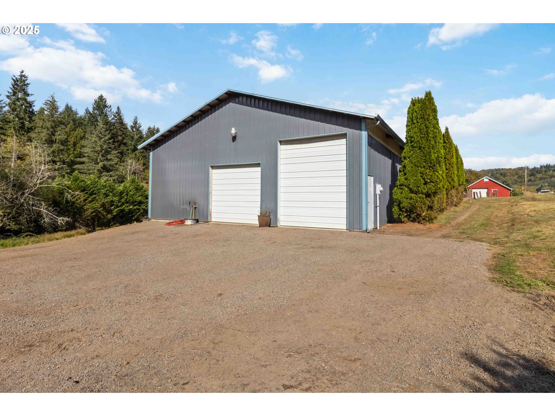 720 Abernathy Creek Road Longview, WA 98632 - Photo 36 of 44 a view of a house with a outdoor space