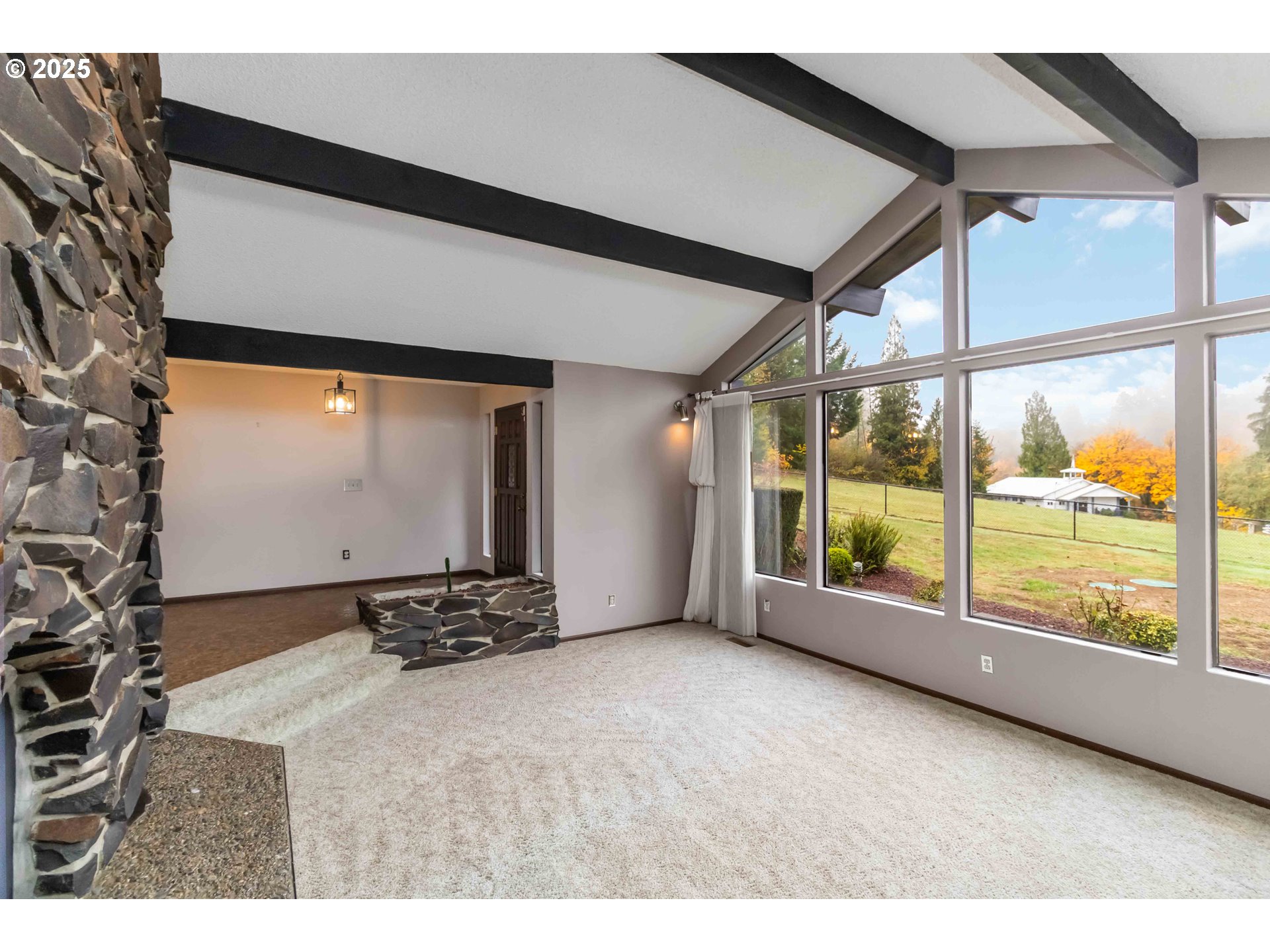 720 Abernathy Creek Road Longview, WA 98632 - Photo 5 of 44 a view of an empty room with a window