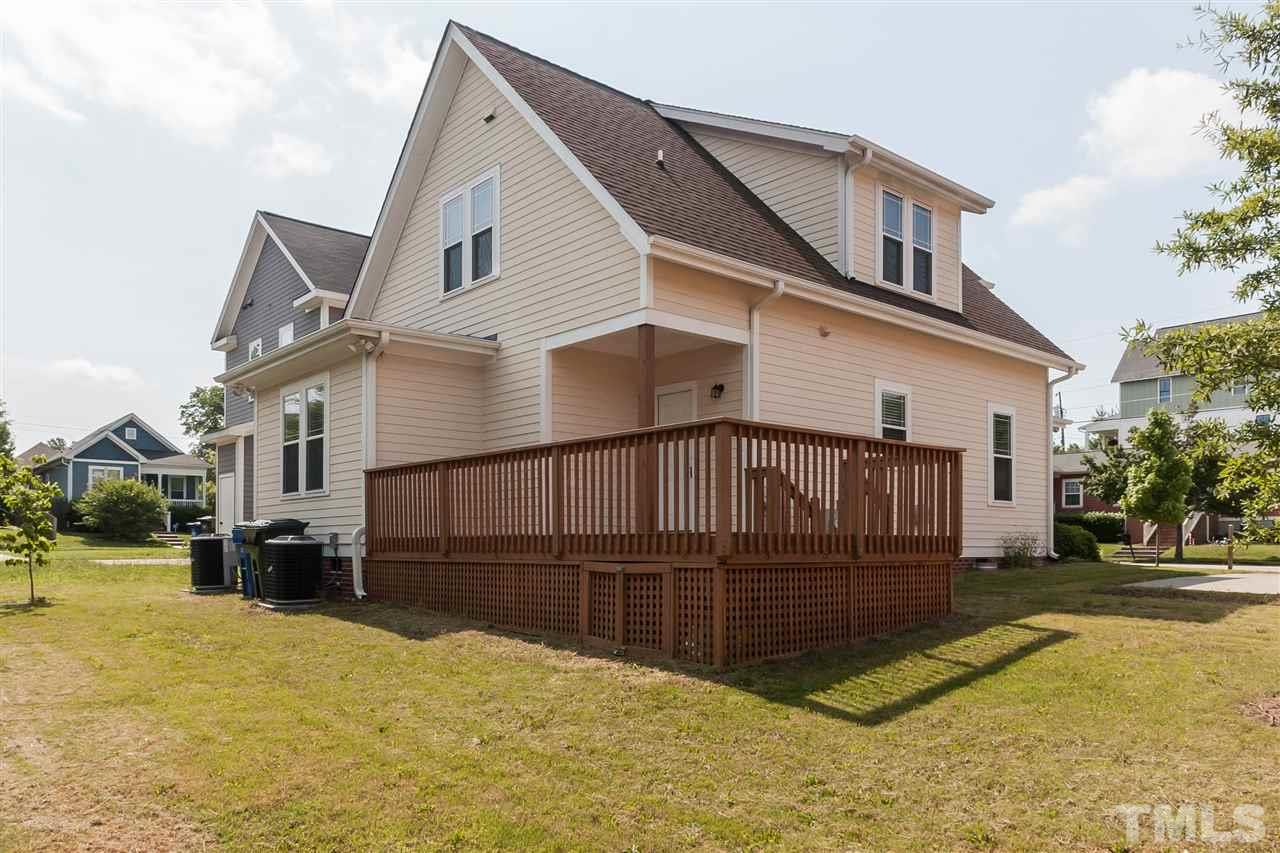 807 East Jones Street Raleigh, NC 27601 - Photo 22 of 23 a view of a house with a yard