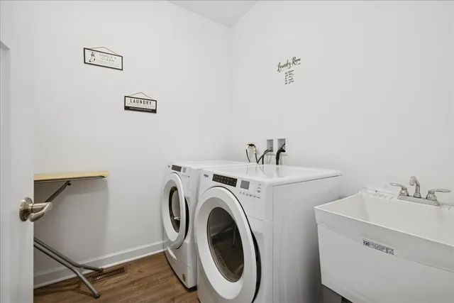 a utility room with dryer and washer