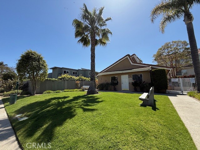 5225 Columbus Place Oxnard, CA 93033 - Photo 8 of 11 a front view of a house with garden