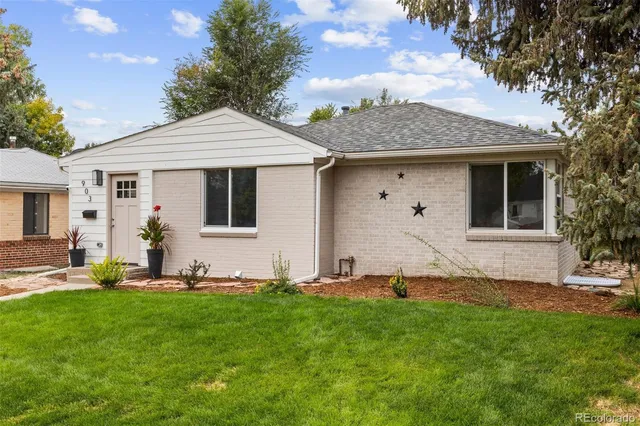 a front view of house with yard
