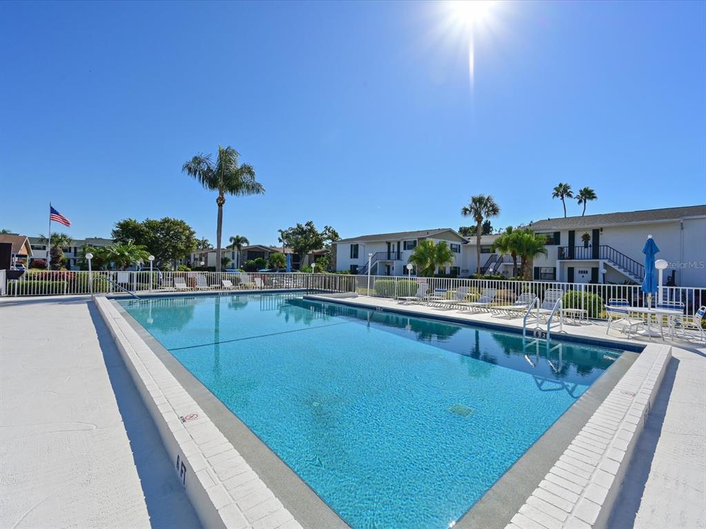 5400 34th Street West, Unit I9 Bradenton, FL 34210 - Photo 32 of 39 a view of swimming pool from a balcony