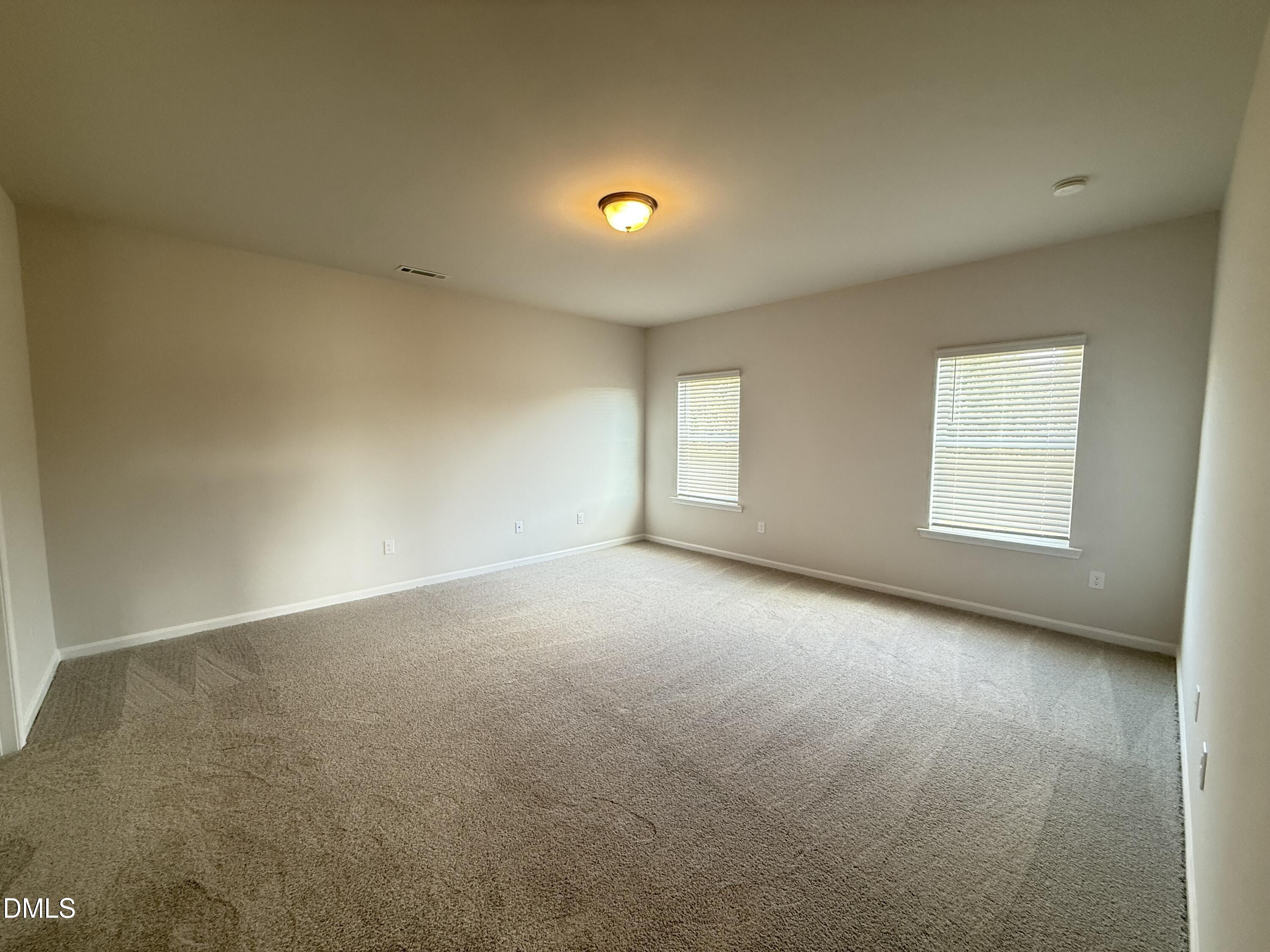 48 Spirit Spgs Road Smithfield, NC 27577 - Photo 14 of 24 a view of an empty room with a window