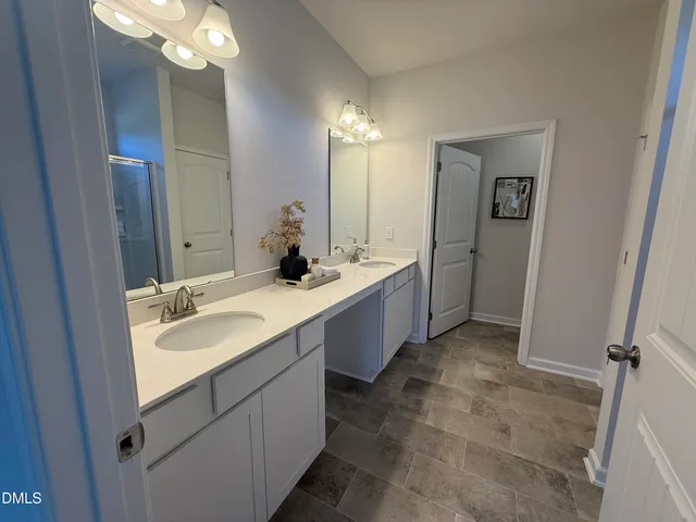 a view of a park with large trees