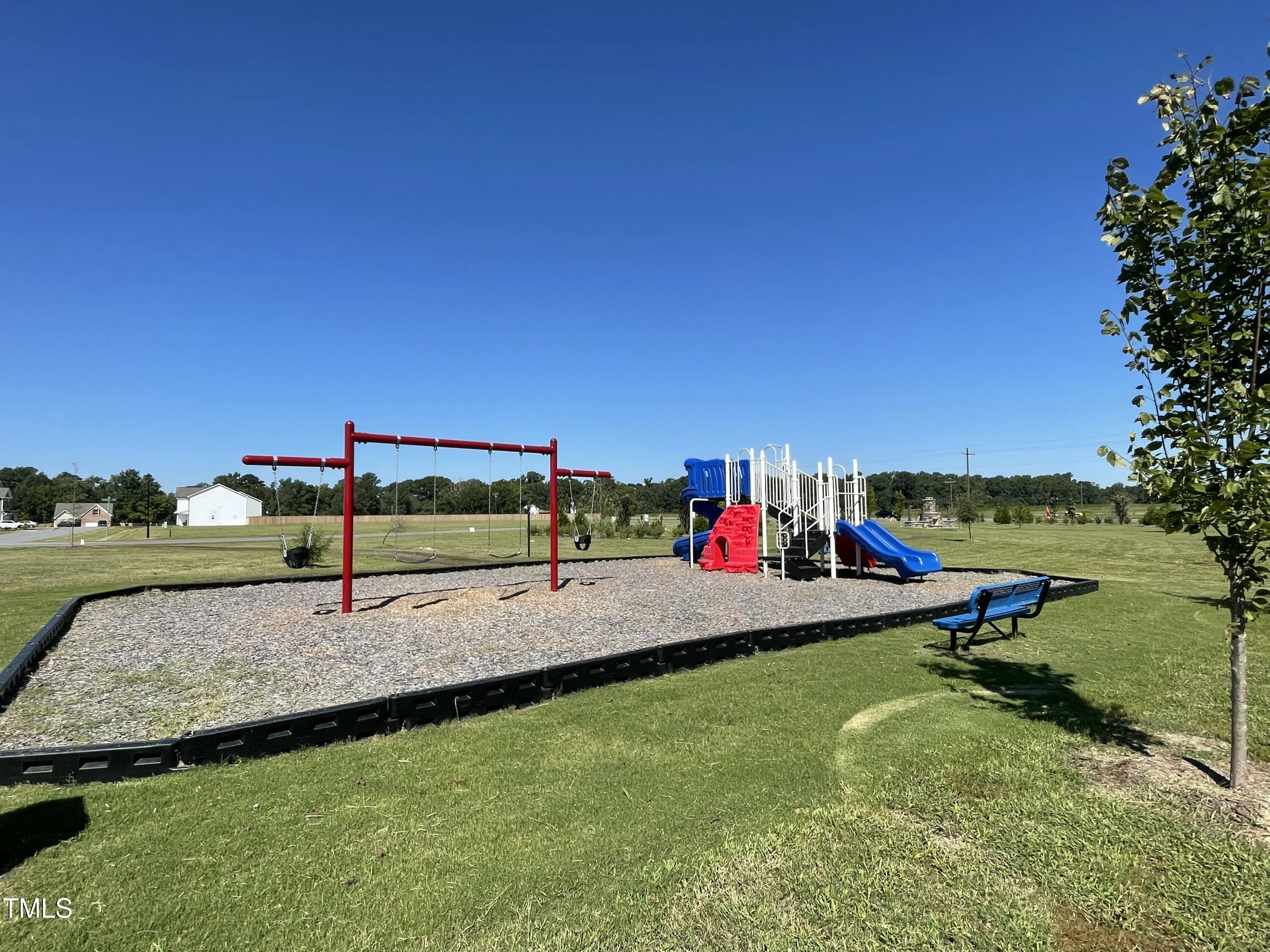 48 Spirit Spgs Road Smithfield, NC 27577 - Photo 21 of 24 a view of a park with large trees