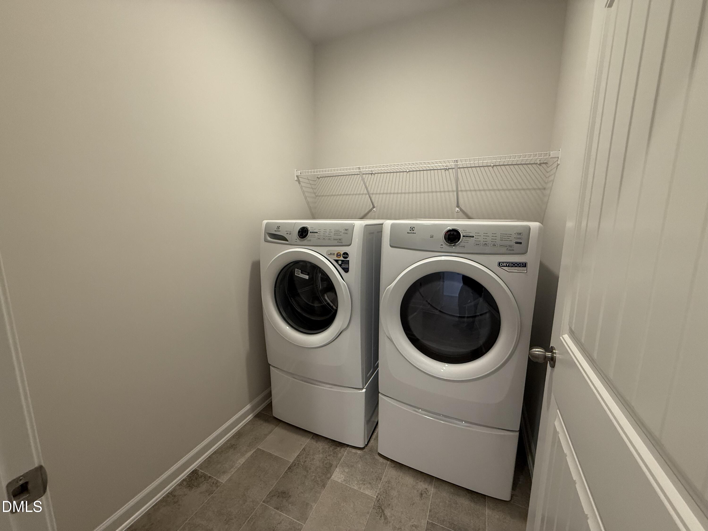 48 Spirit Spgs Road Smithfield, NC 27577 - Photo 4 of 24 a utility room with dryer and washer