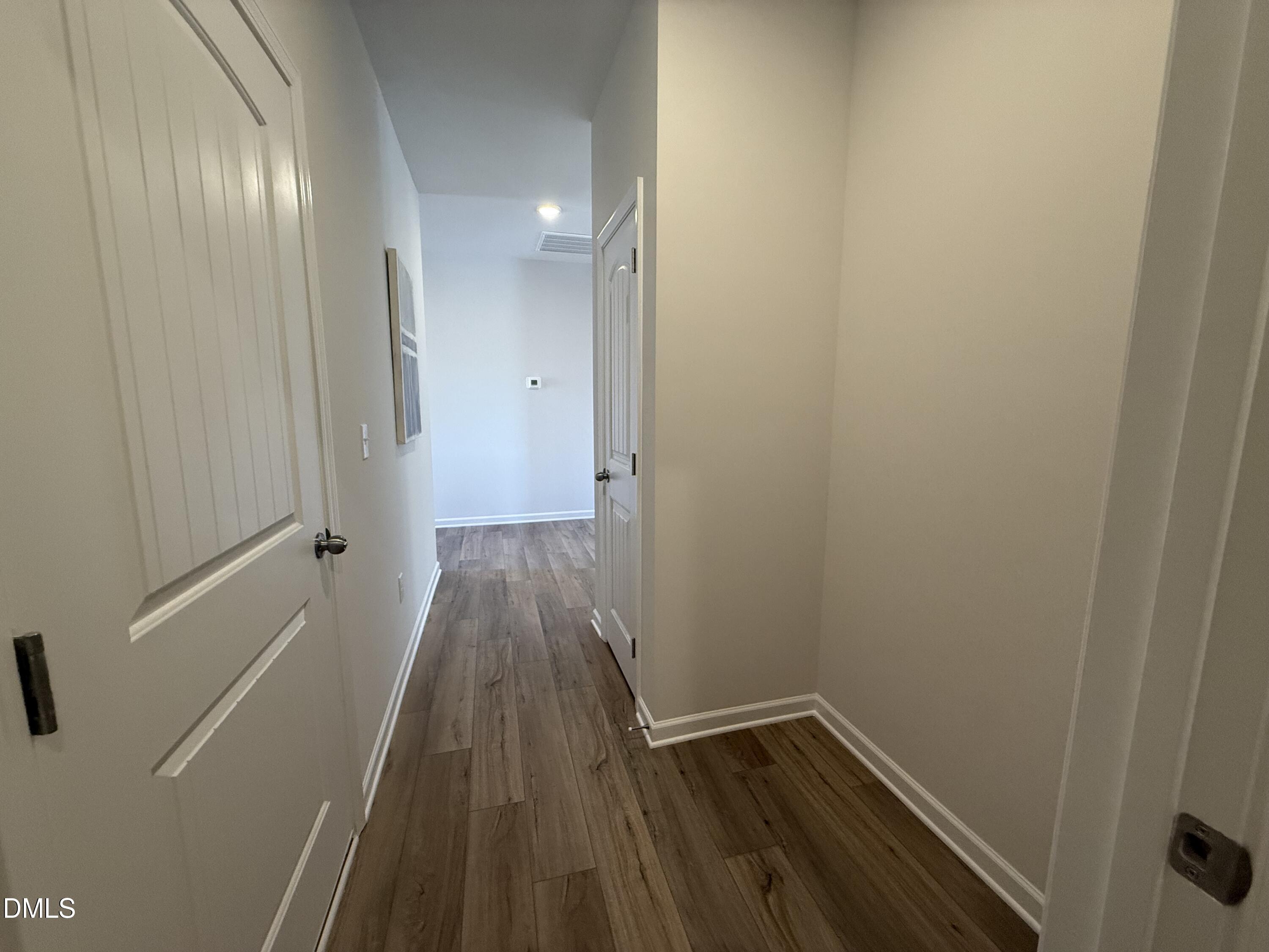 48 Spirit Spgs Road Smithfield, NC 27577 - Photo 5 of 24 a view of a room with wooden floor and a sink