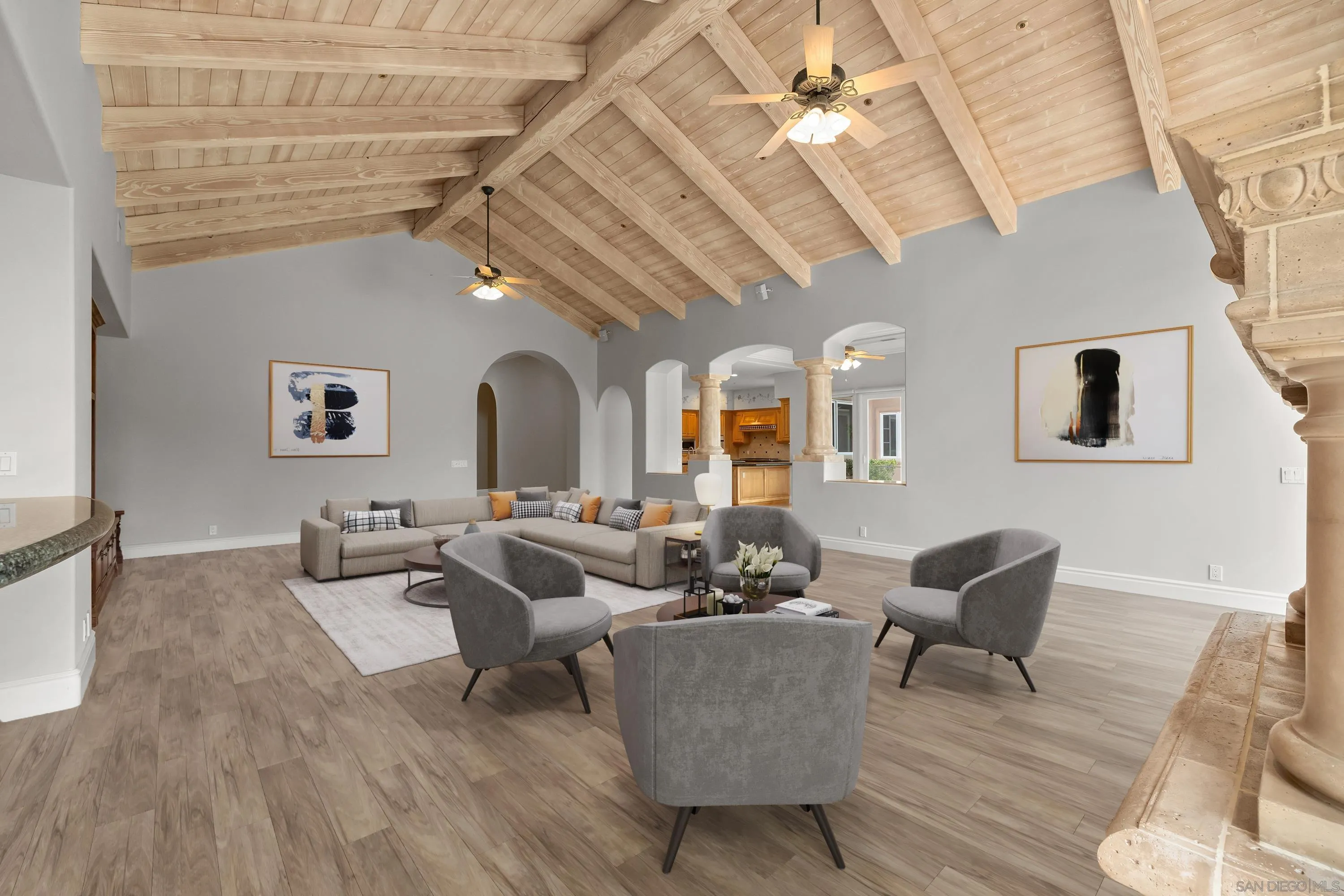 18050 Rancho La Cima Corte Rancho Santa Fe, CA 92067 - Photo 19 of 57 a living room with patio furniture and a chandelier