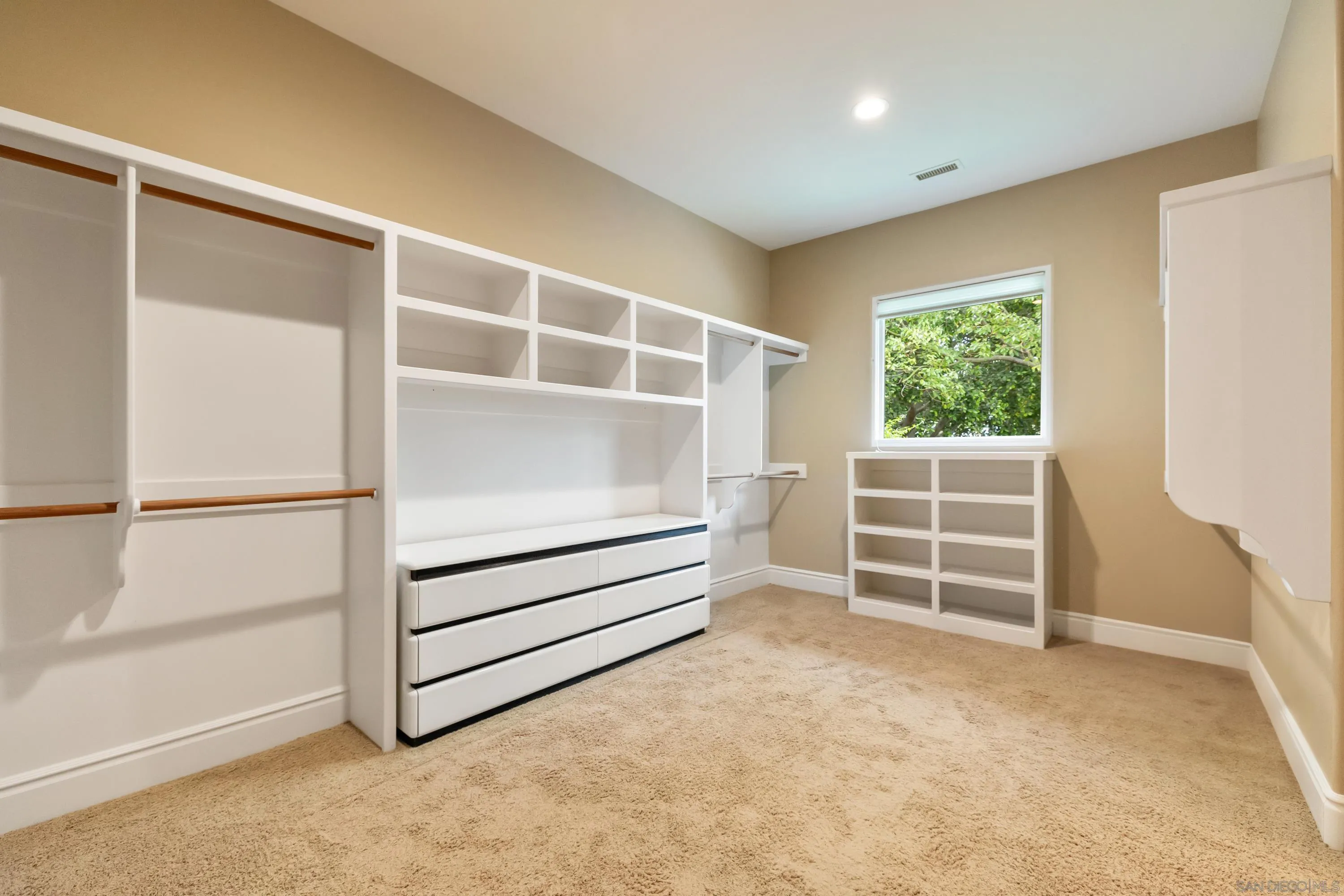 18050 Rancho La Cima Corte Rancho Santa Fe, CA 92067 - Photo 30 of 57 a view of an empty room with a window