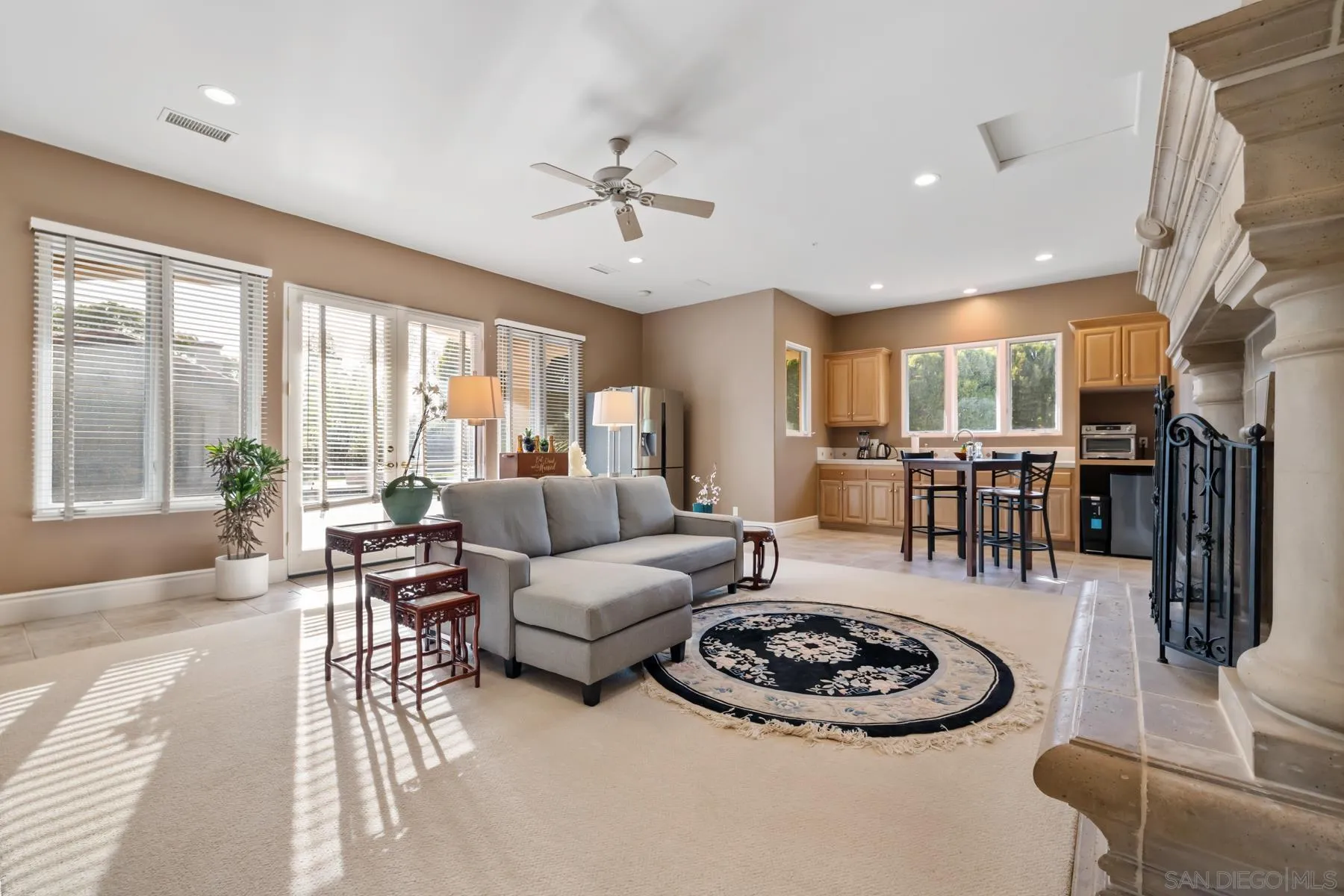 18050 Rancho La Cima Corte Rancho Santa Fe, CA 92067 - Photo 46 of 57 a living room with furniture and a large window