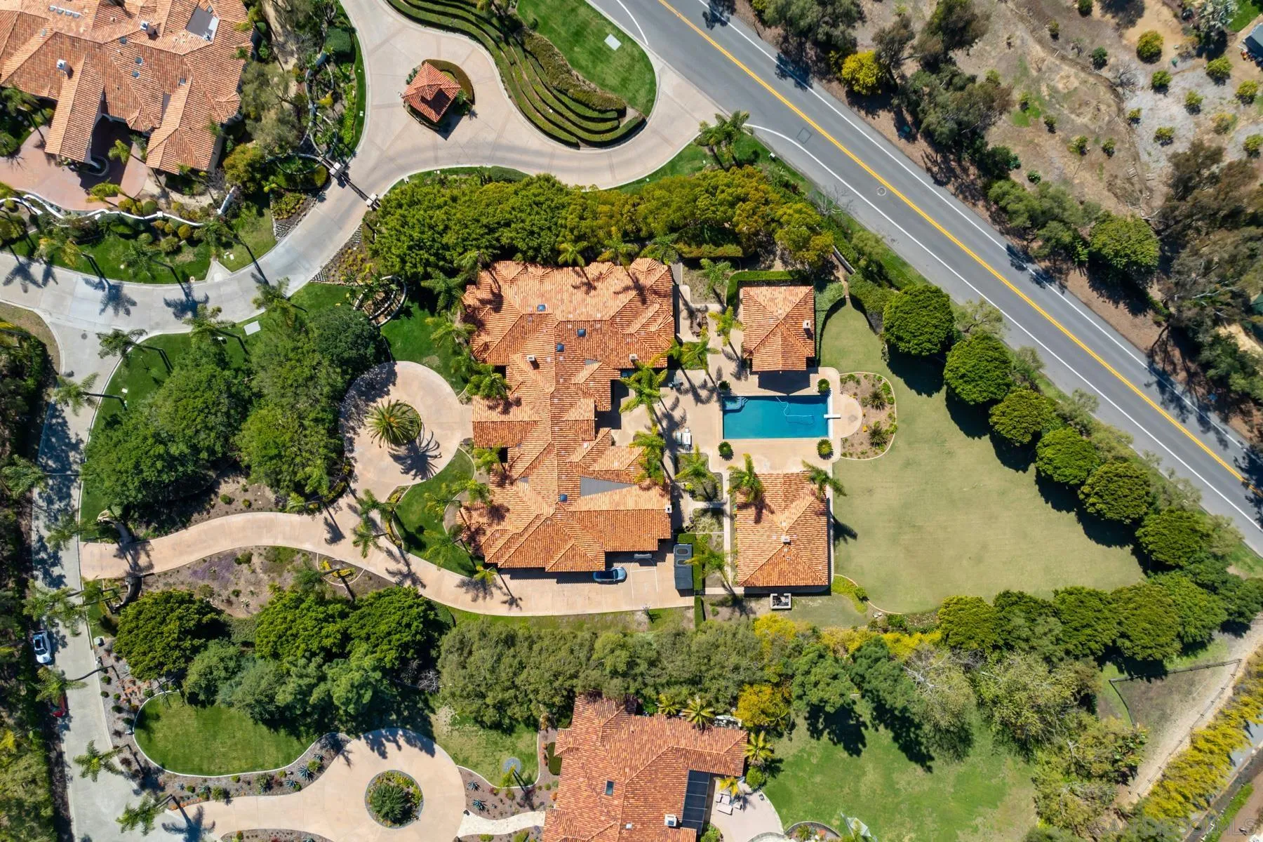 18050 Rancho La Cima Corte Rancho Santa Fe, CA 92067 - Photo 55 of 57 an aerial view of a house