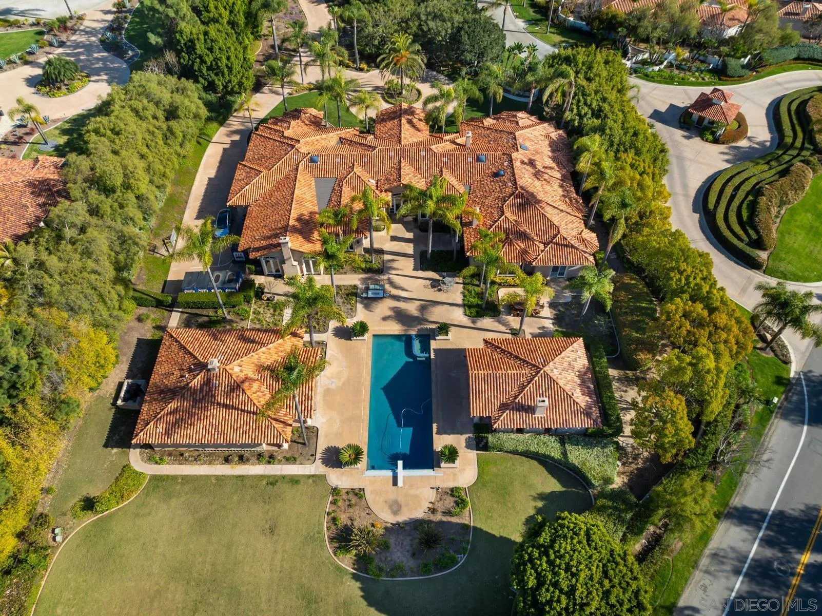 18050 Rancho La Cima Corte Rancho Santa Fe, CA 92067 - Photo 6 of 57 an aerial view of residential houses with outdoor space and trees