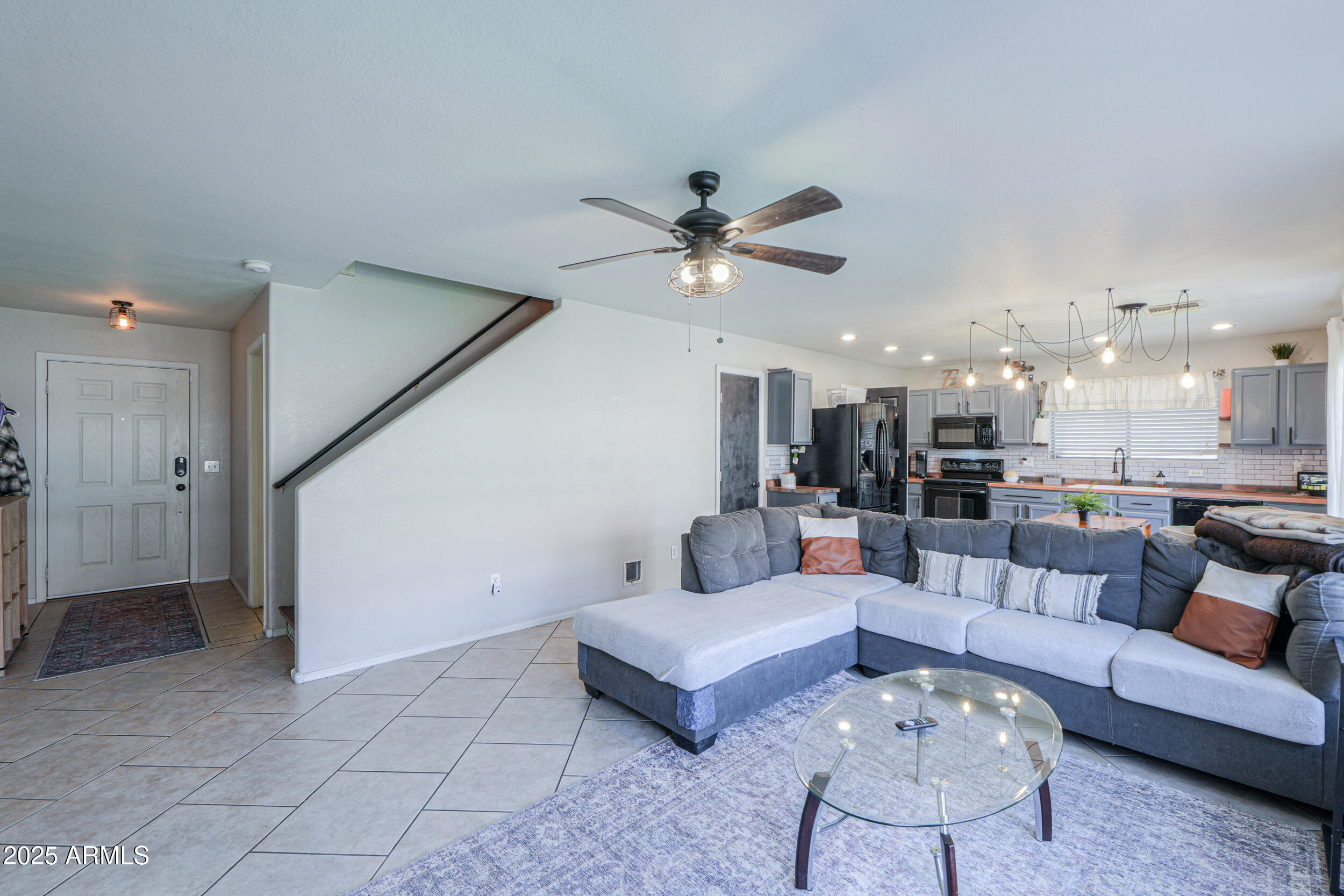 3433 South Chaparral Road Apache Junction, AZ 85119 - Photo 16 of 37 a living room with furniture and kitchen view