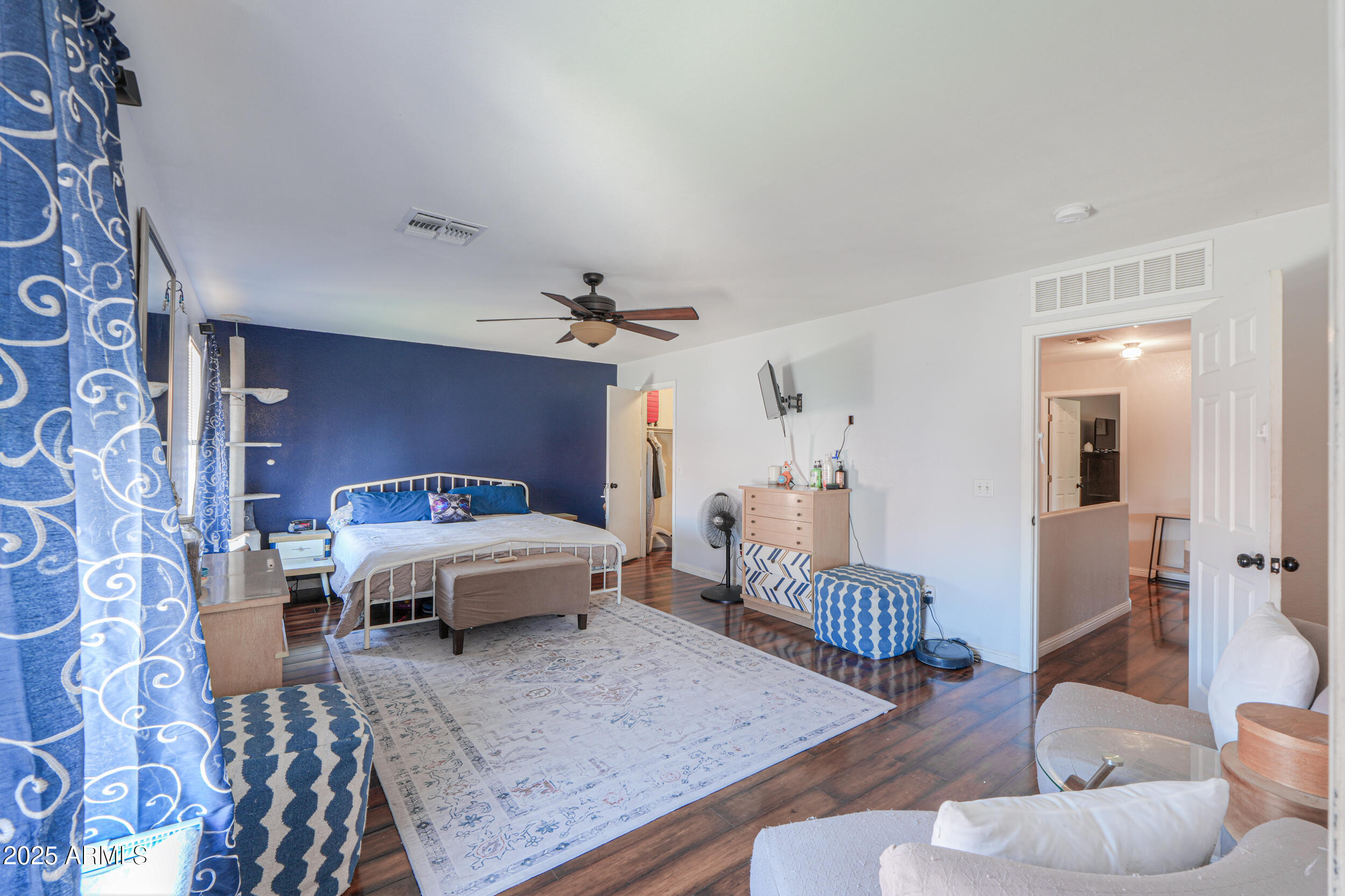 3433 South Chaparral Road Apache Junction, AZ 85119 - Photo 19 of 37 a living room with furniture and wooden floor
