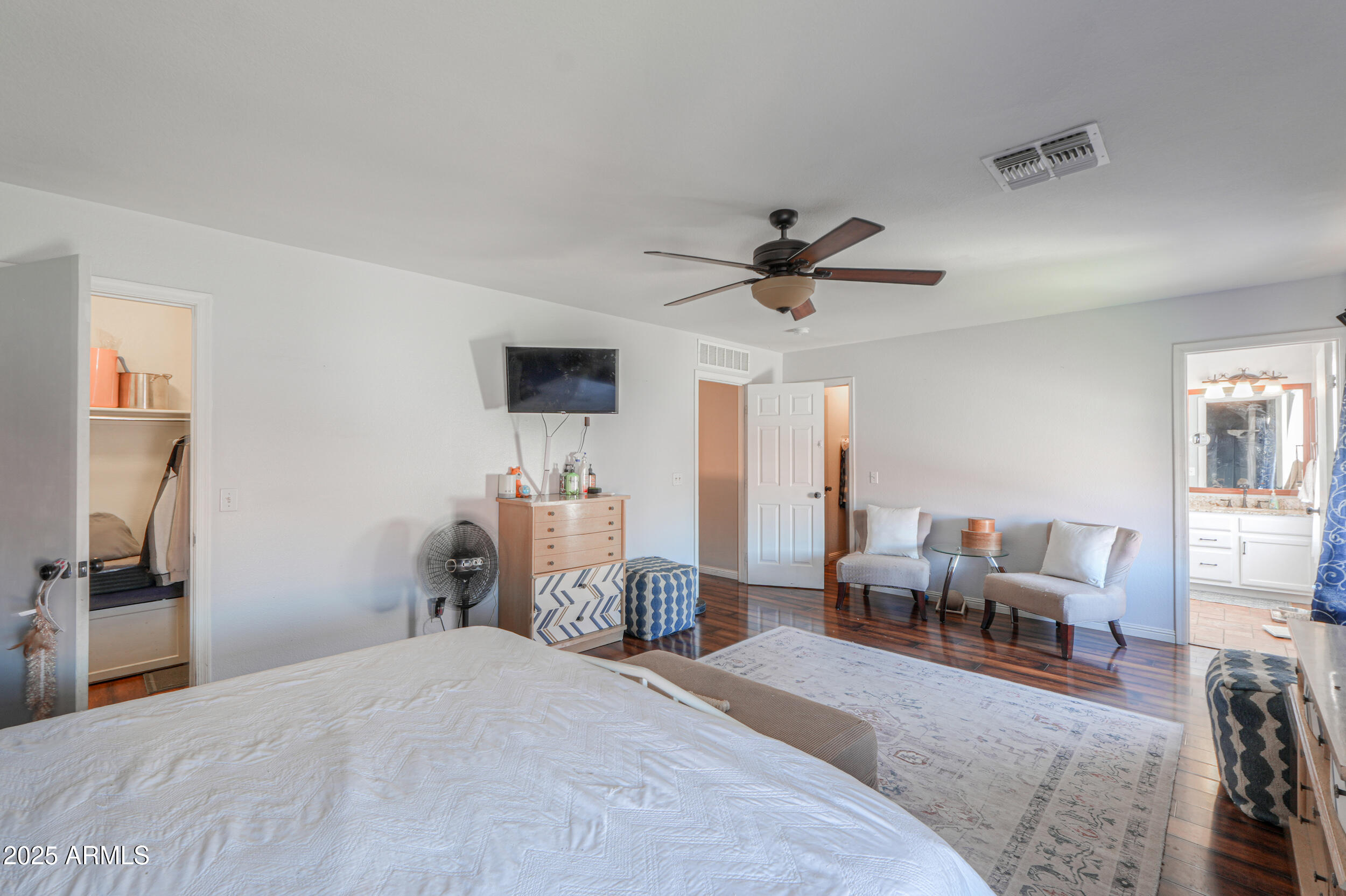 3433 South Chaparral Road Apache Junction, AZ 85119 - Photo 20 of 37 a bedroom with furniture and a large window