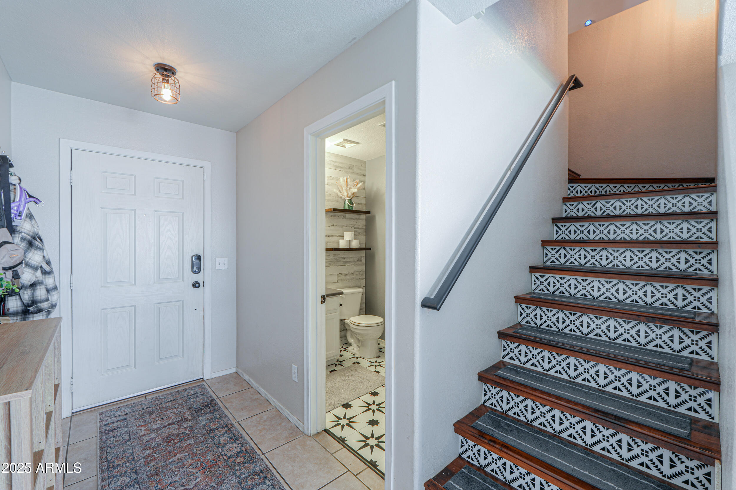 3433 South Chaparral Road Apache Junction, AZ 85119 - Photo 7 of 37 a view of entryway with stairs and wooden floor