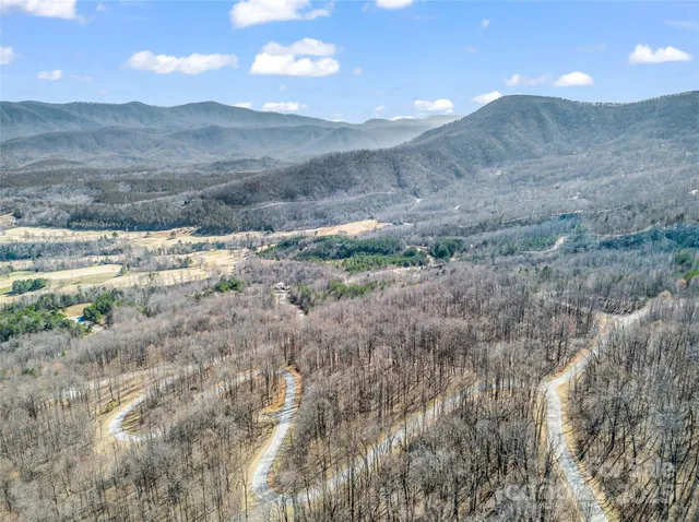 a view of mountain view with lots of trees