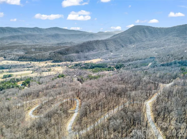 a view of mountain view with lots of trees