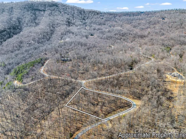a view of balcony with wooden floor