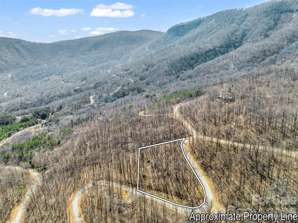 a view of a backyard of the house