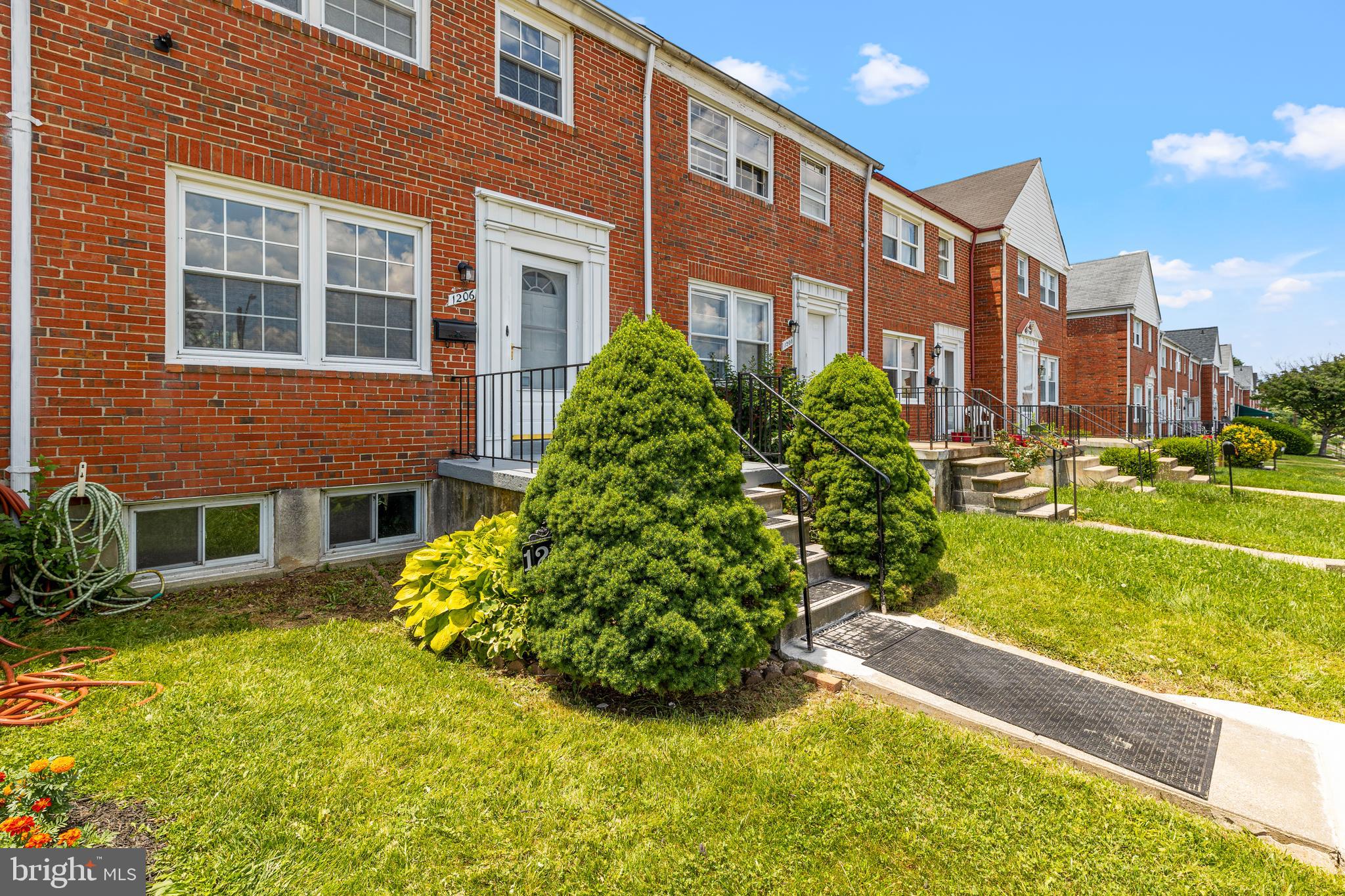 1206 Newfield Road Gwynn Oak, MD 21207 - Photo 2 of 26 a view of a house with a yard