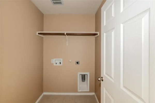 a view of a lake with a house in the background