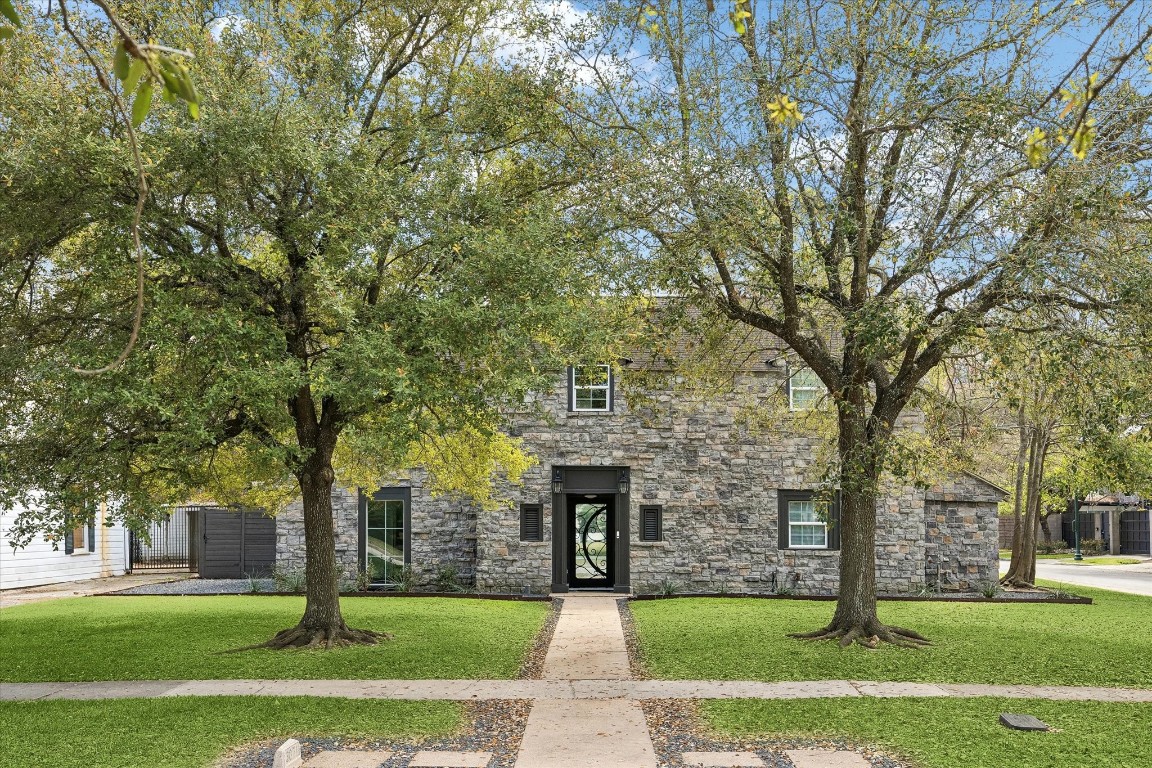 3071 Locke Lane Houston, TX 77019 - Photo 41 of 44 This corner-lot home boasts a stunning stone exterior and offers 5 bedrooms and 4.5 bathrooms. Elegant design and timeless curb appeal make it an ideal setting for everyday living or your dream home vision.